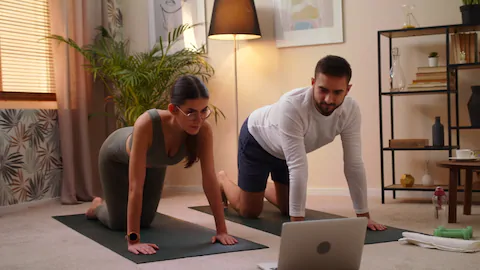 couple exercise at home